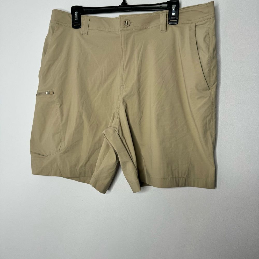 Under Armour tan shorts size 38